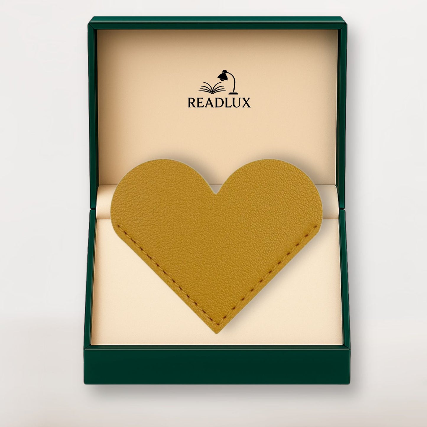 Marque page cuir jaune moutarde en forme de cœur, présenté dans un coffret raffiné Readlux