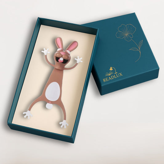 Marque page kawaii lapin brun cartoon, grandes oreilles roses, sourire espiègle, design 3D souple et rigolo
