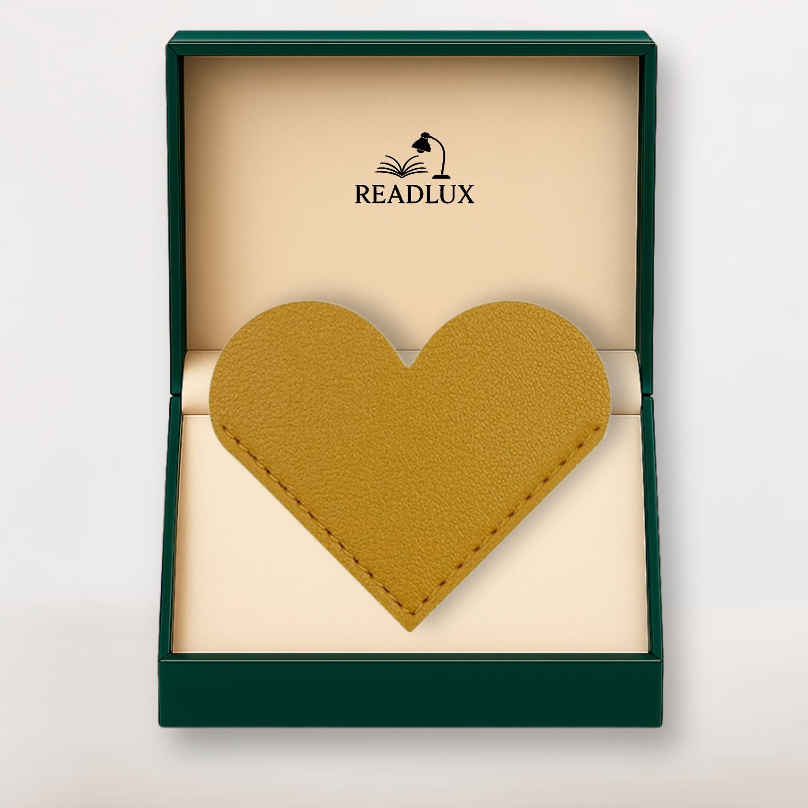 Marque page cuir jaune moutarde en forme de cœur, présenté dans un coffret raffiné Readlux
