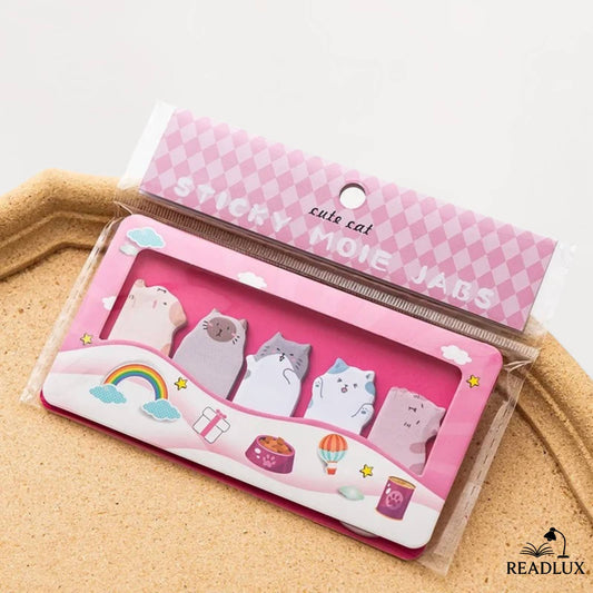 Bloc marquepage adhésif rose pastel avec chats kawaii, idéal pour lectures et révisions ludiques.