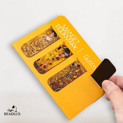 4 marque pages magnétiques Gustav Klimt avec reproductions dorées de ses œuvres emblématiques sur fond jaune vif.