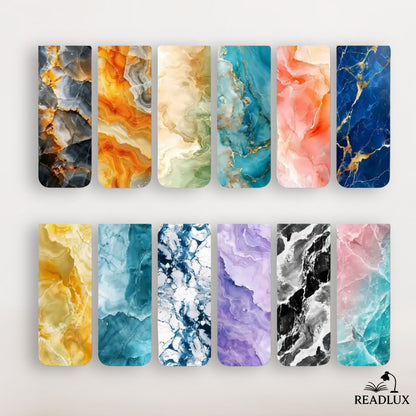 Lot de marque pages magnétiques avec motifs effet marbre coloré, dégradés de bleu, orange, rose, violet et doré.