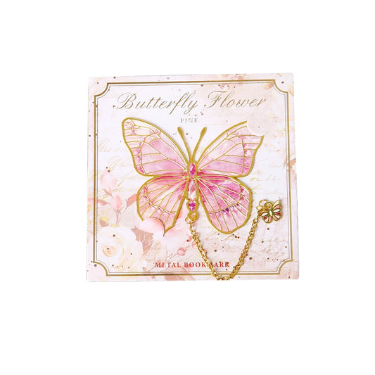 Marque page papillon rose doré présenté sur carte florale avec chaînette raffinée